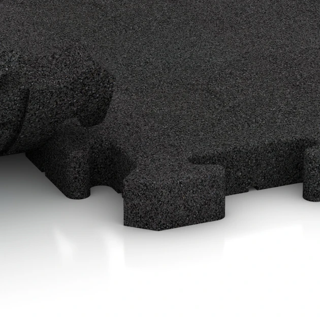 Le gros plan sur le système de connexion des revêtements de sol WARCO 4185 - Revêtement sportif en caoutchouc en couleur Anthracite. Les dimensions 50 x 50 x 4 cm | 0,25 m².