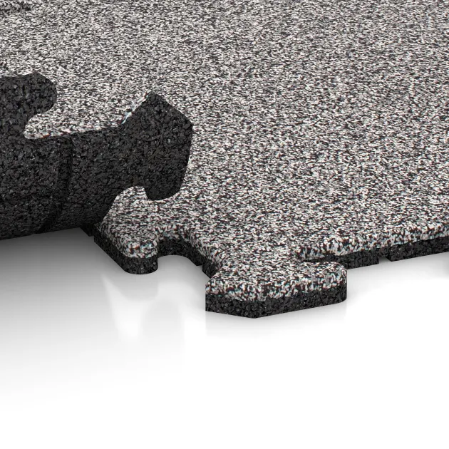Le gros plan sur le système de connexion des revêtements de sol WARCO 4585 - Dalle sportive 1,8 cm en couleur Gris mélange. Les dimensions 500 x 500 x 18 mm.