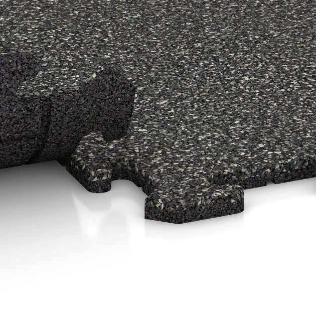 Le gros plan sur le système de connexion des revêtements de sol WARCO 0286 - Revêtement en caoutchouc pour escaliers en couleur Granit gris foncé. Les dimensions 100 x 100 x 1,8 cm | 1,00 m².