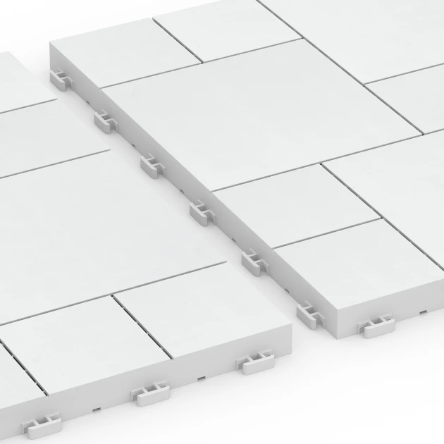 Le gros plan sur le système de connexion des revêtements de sol WARCO 6333 - Motif bloc – Dalle clipsable en couleur Craie. Les dimensions 38,5 x 38,5 x 2 cm.
