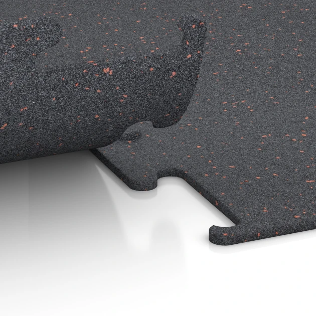 Le gros plan sur le système de connexion des revêtements de sol WARCO 3765 - Fitness Performance Elite Revêtement Sportif en couleur Rouge doux moucheté. Les dimensions 50 x 50 x 1 cm | 0,25 m².