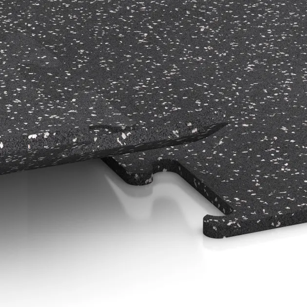 Le gros plan sur le système de connexion des revêtements de sol WARCO 3780 - Revêtement sportif Fitness Performance Elite en couleur Gris doux moucheté. Les dimensions 500 x 500 x 15 mm.