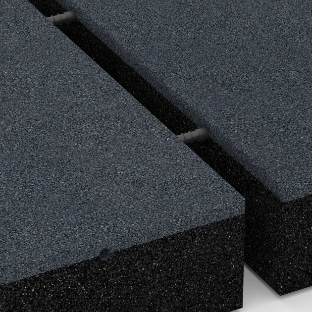 Le gros plan sur le système de connexion des revêtements de sol WARCO 6230 - Dalles amortissantes en couleur Gris ardoise. Les dimensions 50 x 50 x 11 cm.