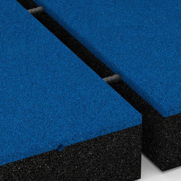 Le gros plan sur le système de connexion des revêtements de sol WARCO 6229 - Dalles amortissantes en couleur Bleu ciel. Les dimensions 50 x 50 x 11 cm.