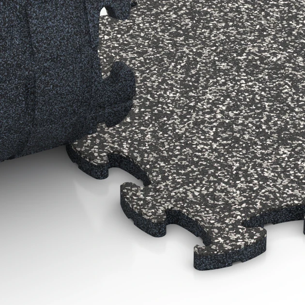 Le gros plan sur le système de connexion des revêtements de sol WARCO 6823 - Fitness Active dalle en couleur Granit gris foncé. Les dimensions 44,6 x 44,6 x 1,8 cm.