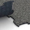 Le gros plan sur le système de connexion des revêtements de sol WARCO 6832 - Fitness Active dalle en couleur Granit gris foncé. Les dimensions 97,1 x 97,1 × 1,8 cm.