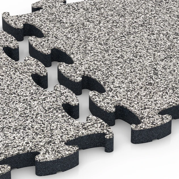 Le gros plan sur le système de connexion des revêtements de sol WARCO 6878 - Dalle Fitness Max en couleur Granit gris. Les dimensions 44,6 x 44,6 × 2,8 cm.