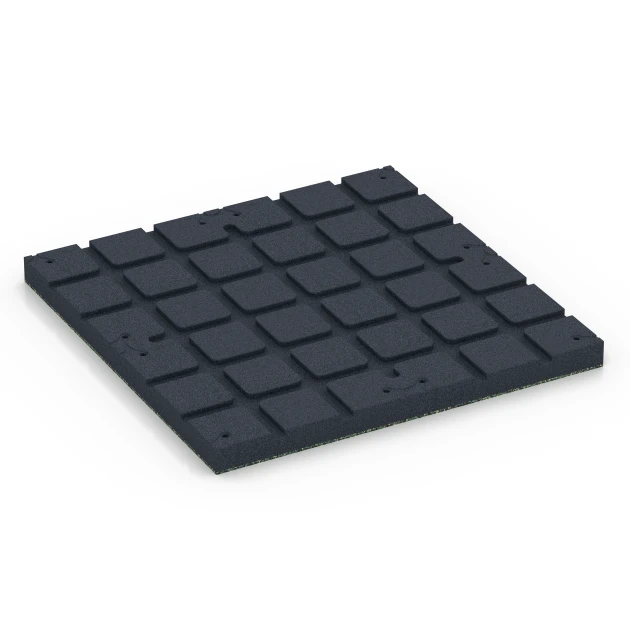 La vue du dessous ou de la face inférieure, c’est-à-dire la face inférieure de la pièce moulée WARCO 7143 - Revêtement sportif extérieur au format 60 x 60 x 4 cm | 0,36 m².