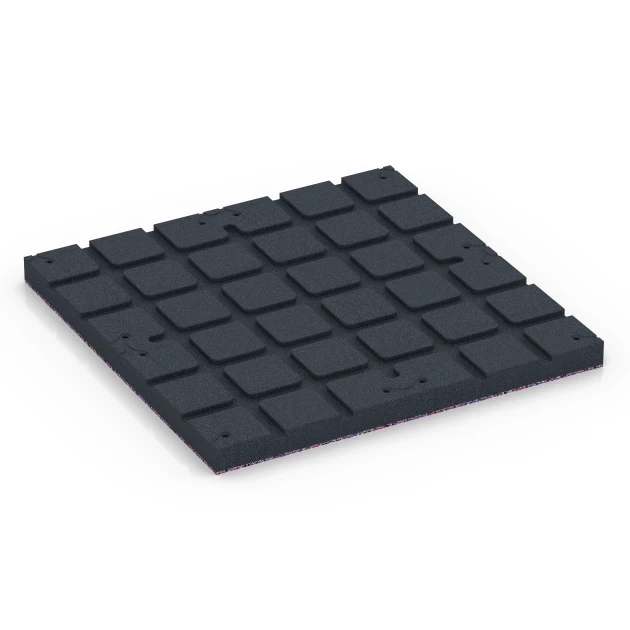 La vue du dessous ou de la face inférieure, c’est-à-dire la face inférieure de la pièce moulée WARCO 7146 - Revêtement sportif extérieur au format 60 x 60 x 4 cm | 0,36 m².